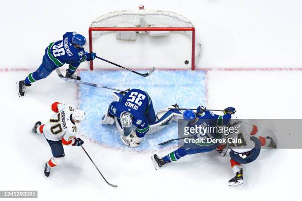 Ryan Lomberg of the Florida Panthers scores a goal on Thatcher Demko of the Vancouver Canucks during the first period of their NHL game at Rogers...