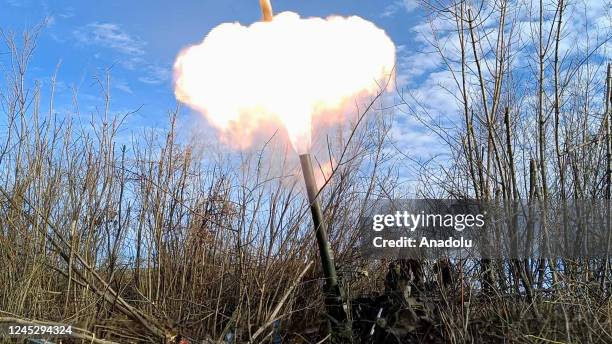 Armed members of the self-proclaimed Donetsk People's Republic fire howitzer on Bakhmut border front in Donetsk, Ukraine on December 1, 2022.