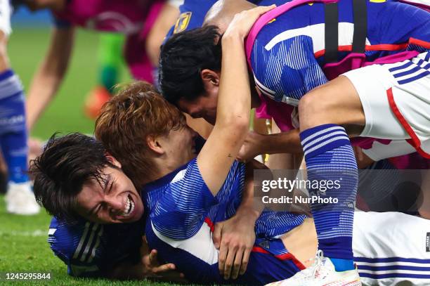 Team Japan celebrates during the World Cup match between Japan v Spain , in Doha, Qatar, on December 1 , 2022. NO USE POLAND