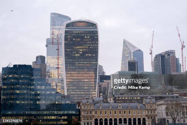 City of London skyline with the Northern & Shell building and 20 Fenchurch Street, affectionately nicknamed the Walkie Talkie in early evening light...