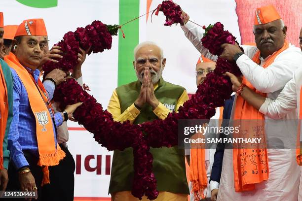 Indian Prime Minister Narendra Modi gestures during a Bhartiya Janta Party rally ahead of 2nd phase of Gujarat's assembly election, in Ahmedabad on...