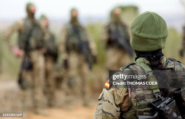 Spanish military instructor trains a group of Ukrainian soldiers in the Spanish army base of Toledo, on December 2, 2022. - Spanish military...