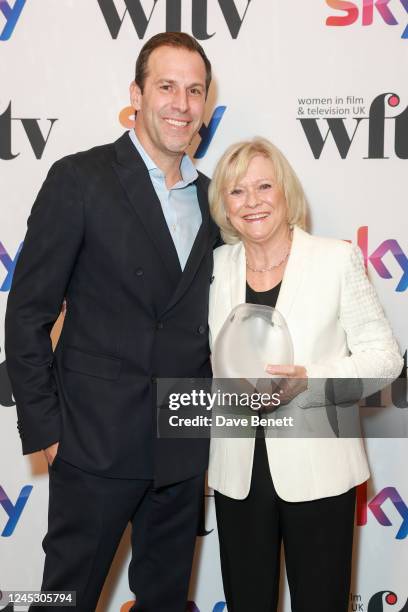 Greg Rusedski presents Sue Barker, winner of The EON Productions Lifetime Achievement Award at the Women In Film & Television Awards 2022 at London...