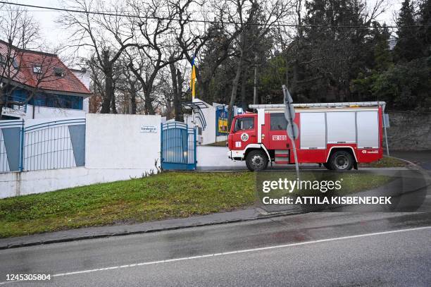 Local fire engine is seen in front of Ukraine's embassy in Budapest on December 02 after a bloody package containing animal eyes was received. - A...