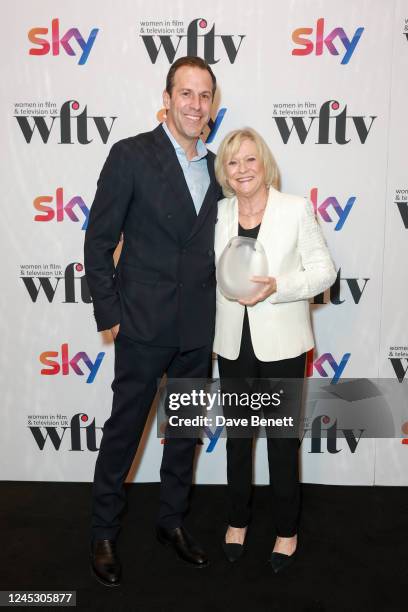 Greg Rusedski presents Sue Barker, winner of The EON Productions Lifetime Achievement Award at the Women In Film & Television Awards 2022 at London...