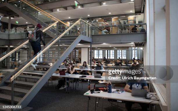 Interior view of the Technical University on December 02, 2022 in Munich, Germany. Students in the university reading room.