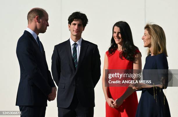 Britain's Prince William, Prince of Wales, is welcomed by US Ambassador to Australia, Caroline Kennedy , Jack Kennedy Schlossberg and Tatiana Kennedy...