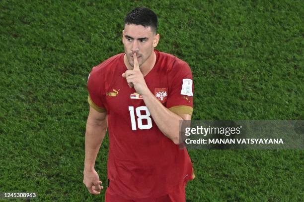 Serbia's forward Dusan Vlahovic celebrates after scoring his team's second goal during the Qatar 2022 World Cup Group G football match between Serbia...