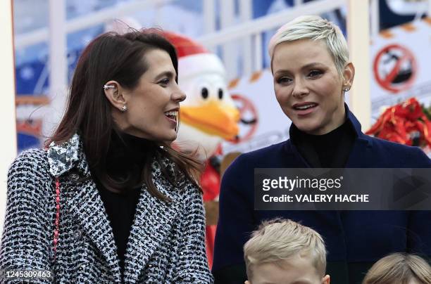 Princess Charlene of Monaco and Charlotte Casiraghi inaugurate the Christmas village in Monaco, on December 2, 2022.