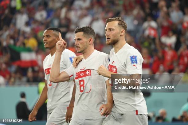 Remo Freuler of Switzerland celebrates with his team mates after scoring a goal to make it 2-3 during the FIFA World Cup Qatar 2022 Group G match...