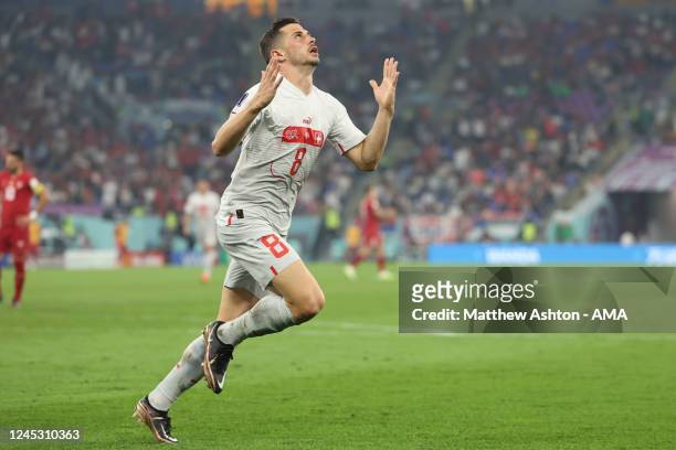 Remo Freuler of Switzerland celebrates after scoring a goal to make it 2-3during the FIFA World Cup Qatar 2022 Group G match between Serbia and...
