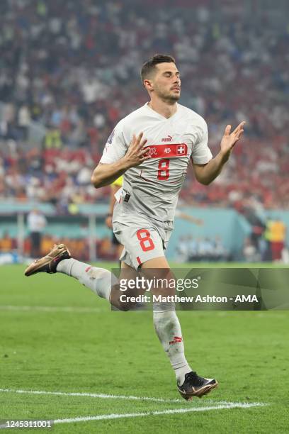 Remo Freuler of Switzerland celebrates after scoring a goal to make it 2-3 during the FIFA World Cup Qatar 2022 Group G match between Serbia and...