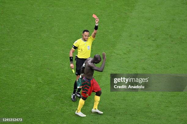 Referee shows a red card to Vincent Aboubakar of Cameroon during the FIFA World Cup Qatar 2022 Group G match between Cameroon and Brazil at Lusail...