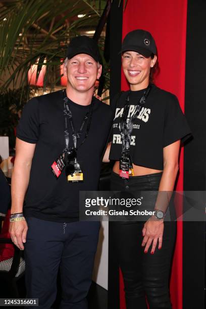 Basti Schweinsteiger and his wife Ana Ivanovic - Schweinsteiger during the Robbie Williams One Show & One Night Only concert at the VIP area at Messe...