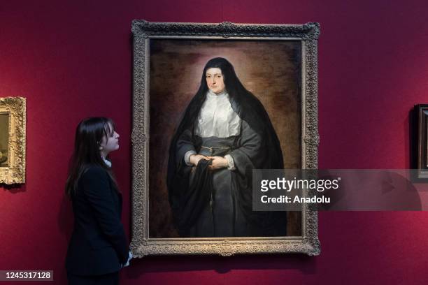 Staff member looks at a painting titled 'Portrait of Isabella Clara Eugenia , Governess of Southern Netherlands, as a widow' Sir Peter Paul Rubens...