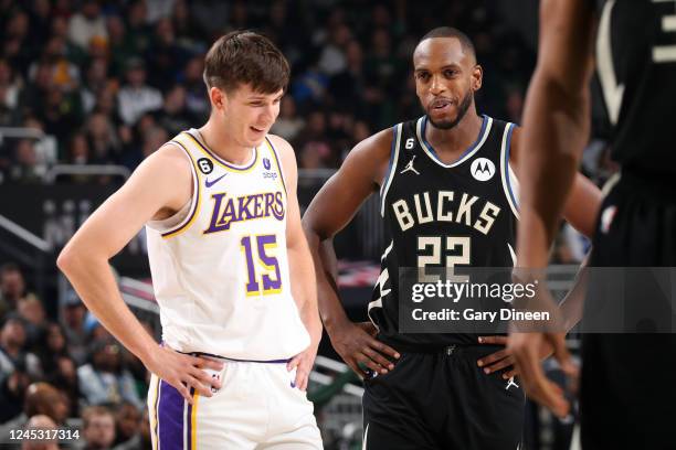 Austin Reaves of the Los Angeles Lakers talks with Khris Middleton of the Milwaukee Bucks during the game on December 2, 2022 at the Fiserv Forum...