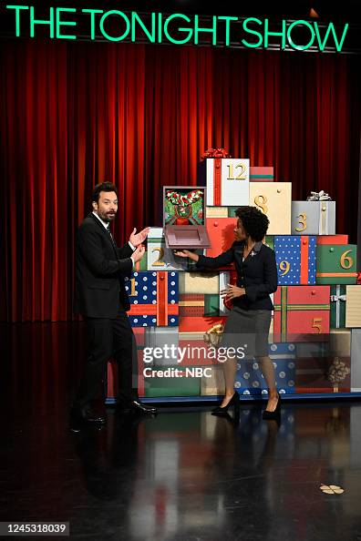 Host Jimmy Fallon and an NBC Page during 12 Days of Xmas Sweaters
