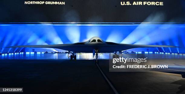 The B-21 Raider is unveiled during a ceremony at Northrop Grumman's Air Force Plant 42 in Palmdale, California, December 2, 2022. - The high-tech...