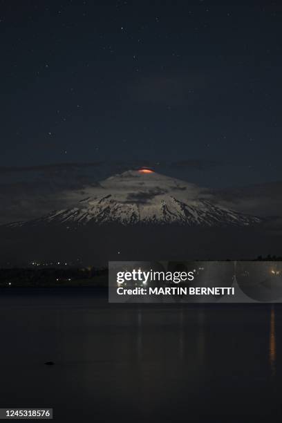 The Villarrica volcano shows signs of activity, as seen from Pucon, some 800 kilometers south of Santiago, on December 2, 2022. - Villarrica volcano...