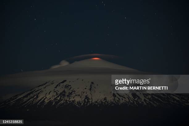 The Villarrica volcano shows signs of activity, as seen from Pucon, some 800 kilometers south of Santiago, on December 2, 2022. - Villarrica volcano...