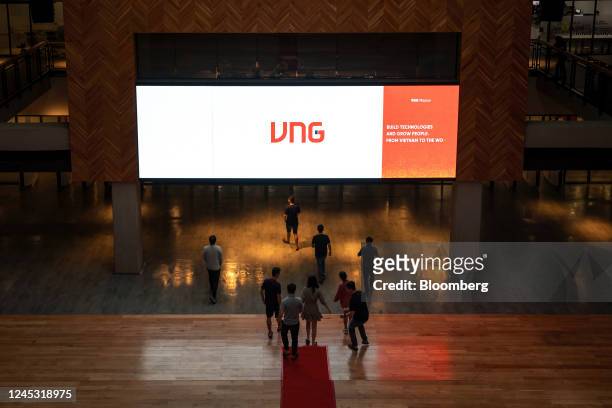 Employees at the Atrium lobby inside the VNG Corp.'s city campus in Ho Chi Minh City, Vietnam, on Thursday, Sept. 22, 2022. VNG, Vietnams answer...