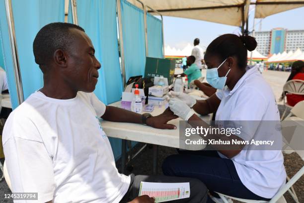 Man gets a medical check-up during an event marking World AIDS Day in Accra, Ghana, on Dec. 1, 2022.