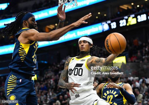 Jordan Clarkson of the Utah Jazz passes around Isaiah Jackson of the Indiana Pacers during the first half of a game at Vivint Arena on December 02,...