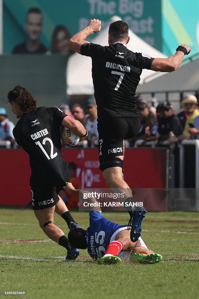 Sam Dickson Rugby Marius Domon of France is tackled by Sam Dickson and Leroy Carter of ...