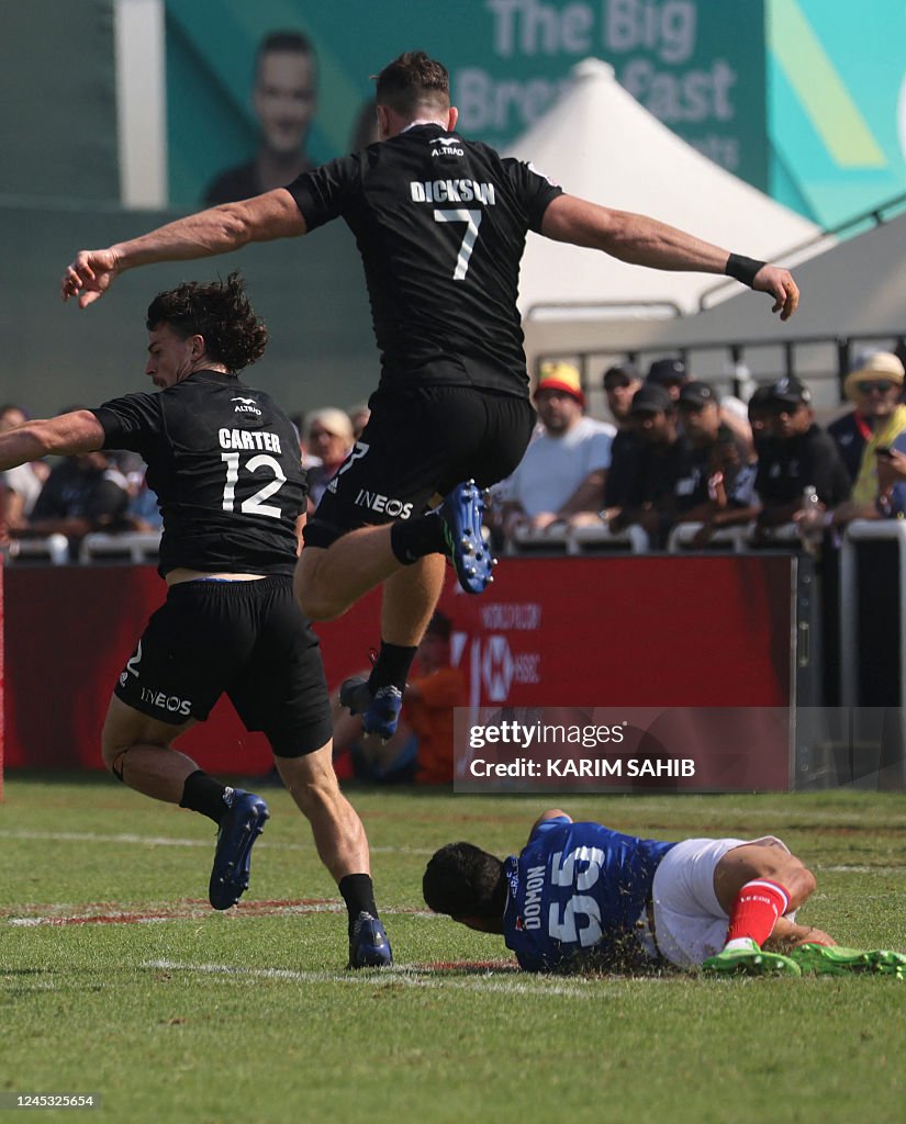 Sam Dickson Rugby Marius Domon of France is tackled by Sam Dickson and Leroy Carter of ...