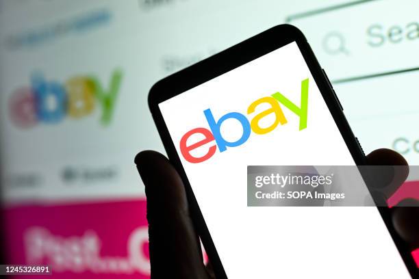 In this photo illustration an ebay logo seen displayed on a smartphone.