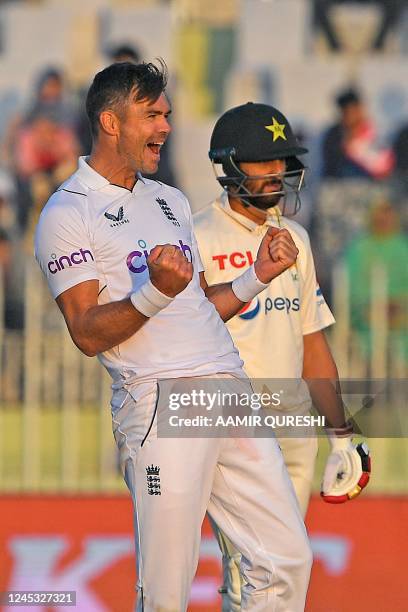 England's James Anderson celebrates after taking the wicket of Pakistan's Mohammad Rizwan during the third day of the first cricket Test match...