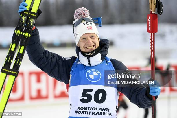 Norway's Johannes Thingnes Bo celebrates winning the men's 10km sprint competition of the IBU Biathlon World Cup in Kontiolahti, Finland on December...