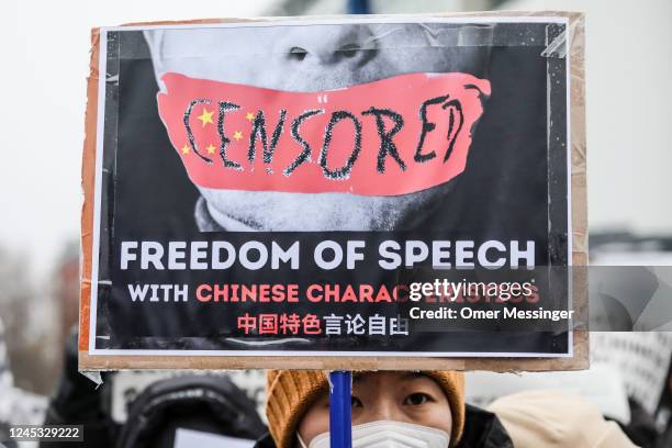 Demonstrators protest in front of the Chinese Embassy in solidarity with protesters in China on December 3, 2022 in Berlin, Germany. Protests have...