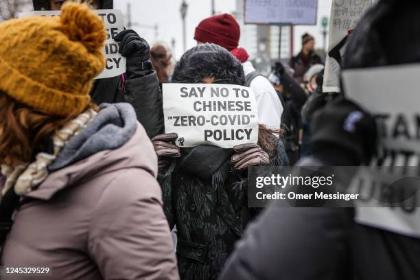 Demonstrators protest in front of the Chinese Embassy in solidarity with protesters in China on December 3, 2022 in Berlin, Germany. Protests have...