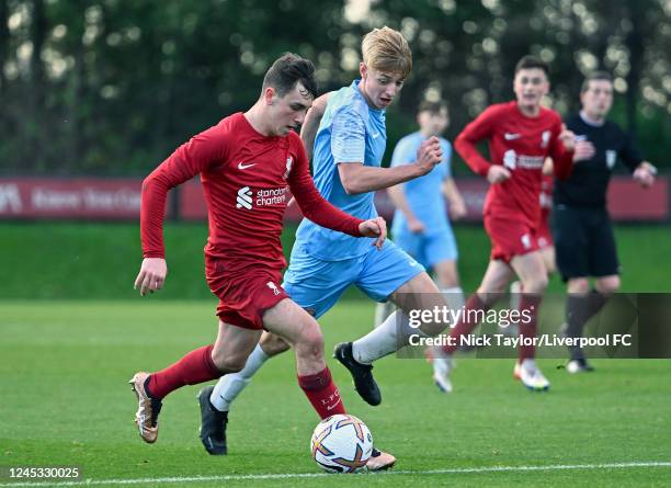 Josh Davidson of Liverpool and Thomas Watson of Sunderland in action on December 3, 2022 in Kirkby, England.