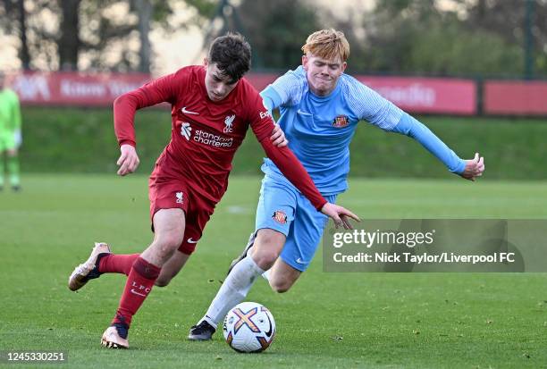 Josh Davidson of Liverpool and Will Cain of Sunderland in action on December 3, 2022 in Kirkby, England.