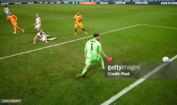 Netherlands' Daley Blind scores their second goal during the FIFA World Cup Qatar 2022 Round of 16 match between Netherlands and USA at Khalifa...
