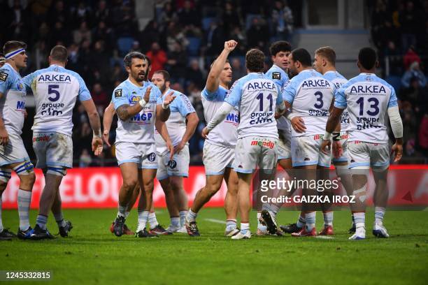 Bayonne's players, including Bayonne's French lock Thomas Ceyte , Bayonne's French left wing Remy Baget , Bayonne's French prop Pascal Cotet and...