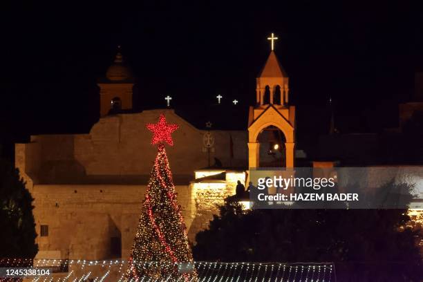 Picture taken on December 3 shows the Christmas tree at the Manger Square near the Church of the Nativity, revered as the site of Jesus Christ's...