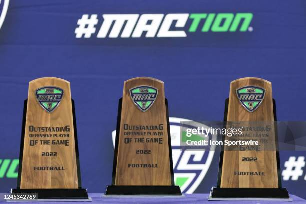 General view of the trophies for the outstanding offensive, defensive, and special teams players of the game is seen during the post-game awards...