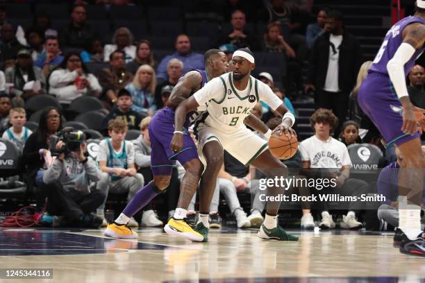 Bobby Portis of the Milwaukee Bucks dribbles the ball during the game against the Charlotte Hornets on December 3, 2022 at Spectrum Center in...