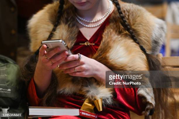 Young woman wearing a fur collar scarf made of fox fur is seen during the 8th Patriot Day organized by the Bialy Kruk publishing house and the...