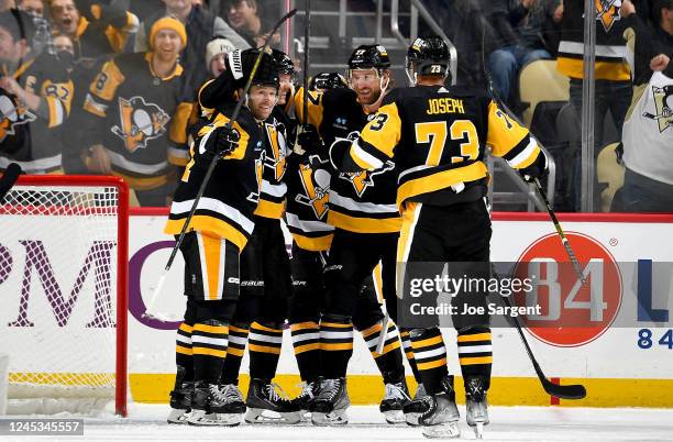 Kasperi Kapanen of the Pittsburgh Penguins celebrates his hat trick in the second period against the St. Louis Blues at PPG PAINTS Arena on December...