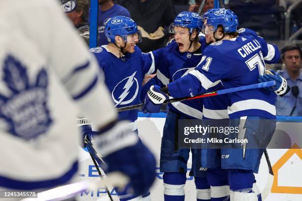 Vladislav Namestnikov of the Tampa Bay Lightning, center, celebrates his goal against the Toronto Maple Leafs with Brayden Point and Anthony Cirelli...