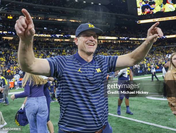Head coach Jim Harbaugh of the Michigan Wolverines celebrates following the game against the Purdue Boilermakers in the Big Ten Championship at Lucas...