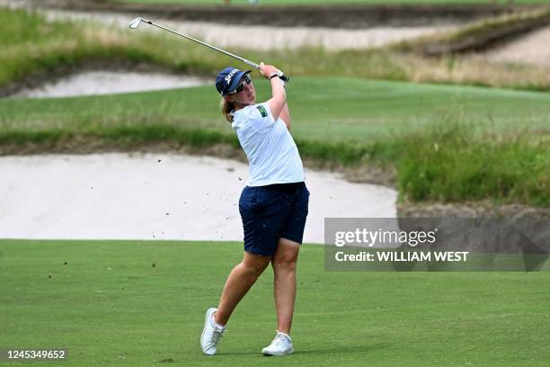 South Africa's Ashleigh Buhai plays a shot on the way to winning the Women's Australian Open golf tournament at the Victoria course in Melbourne on...