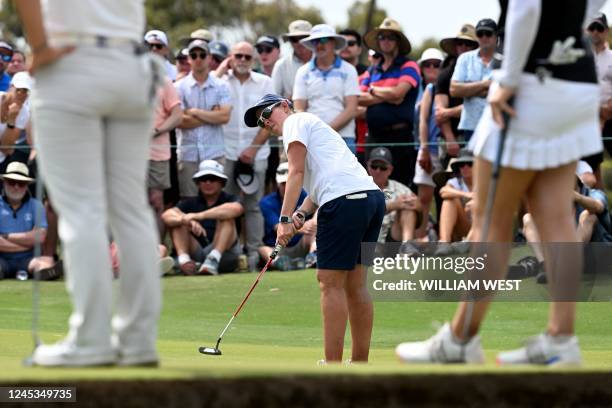 South Africa's Ashleigh Buhai putts on the way to winning the Women's Australian Open golf tournament at the Victoria course in Melbourne on December...