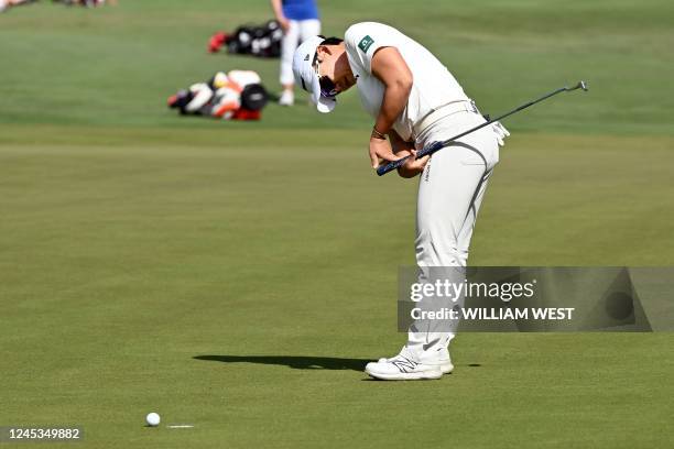 South Korea's Shin Ji-yai reacts as she misses a put on the 18th green during the final round of the Women's Australian Open golf tournament at the...