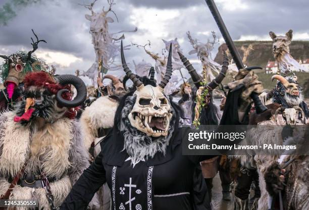 Participants during the Whitby Krampus Run street parade in Whitby, Yorkshire, which celebrates the Krampus, a horned creature who accompanies Saint...