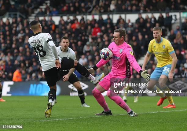 Sheffield Wednesday's David Stockdale saves from Derby County's Lewis Dobbin during the Sky Bet League One between Port Vale and Charlton Athletic at...